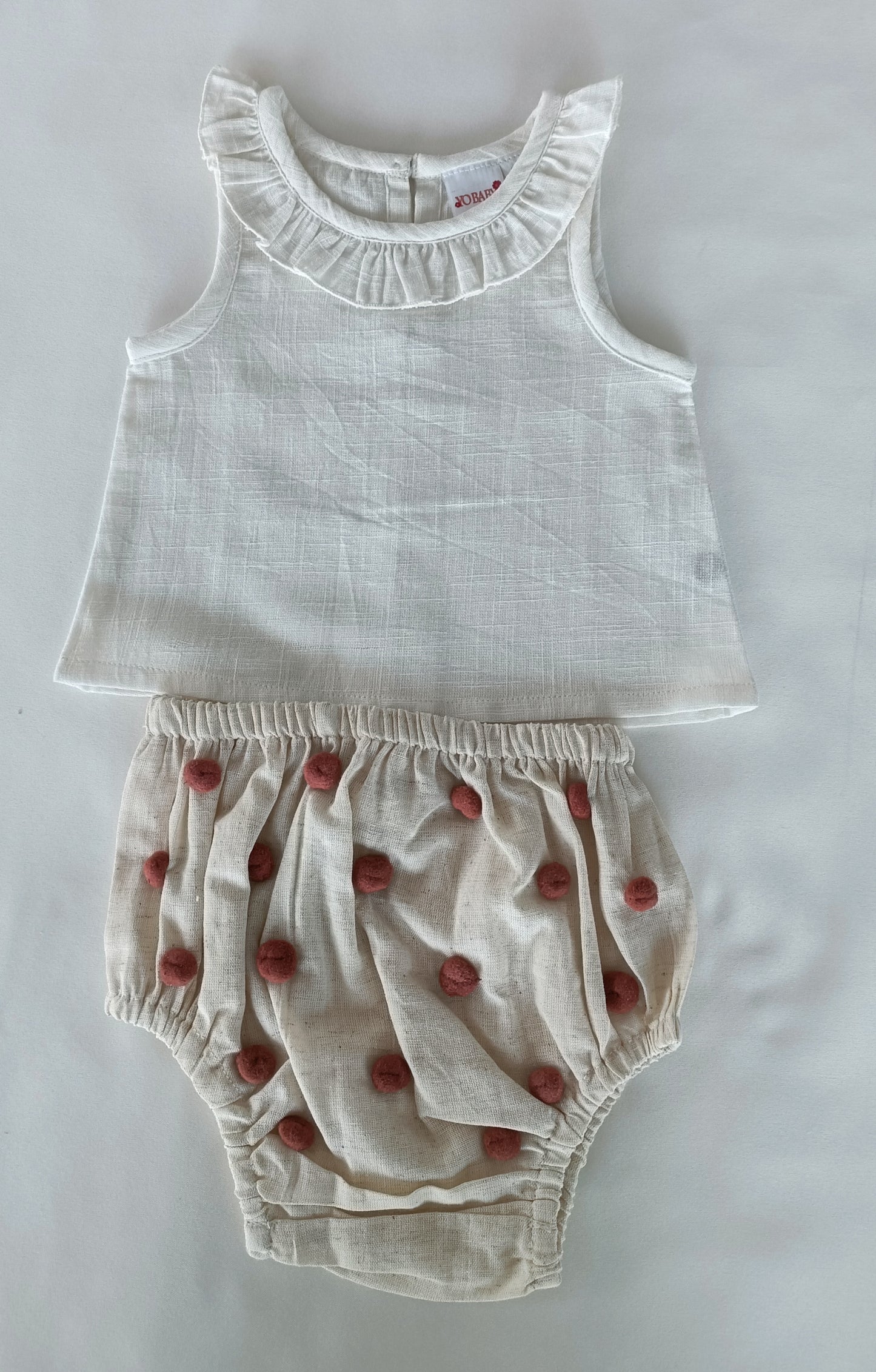 White Ruffle Neck Top & Ivory Diaper Cover With Pom-Poms