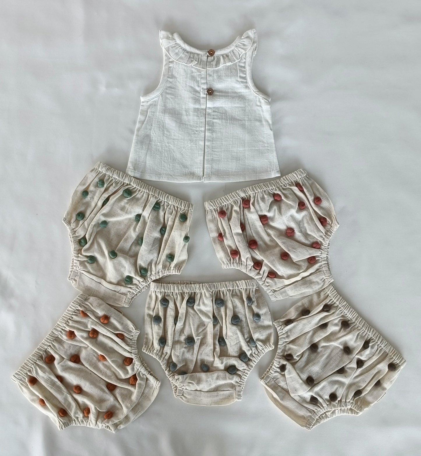 White Ruffle Neck Top & Ivory Diaper Cover With Pom-Poms