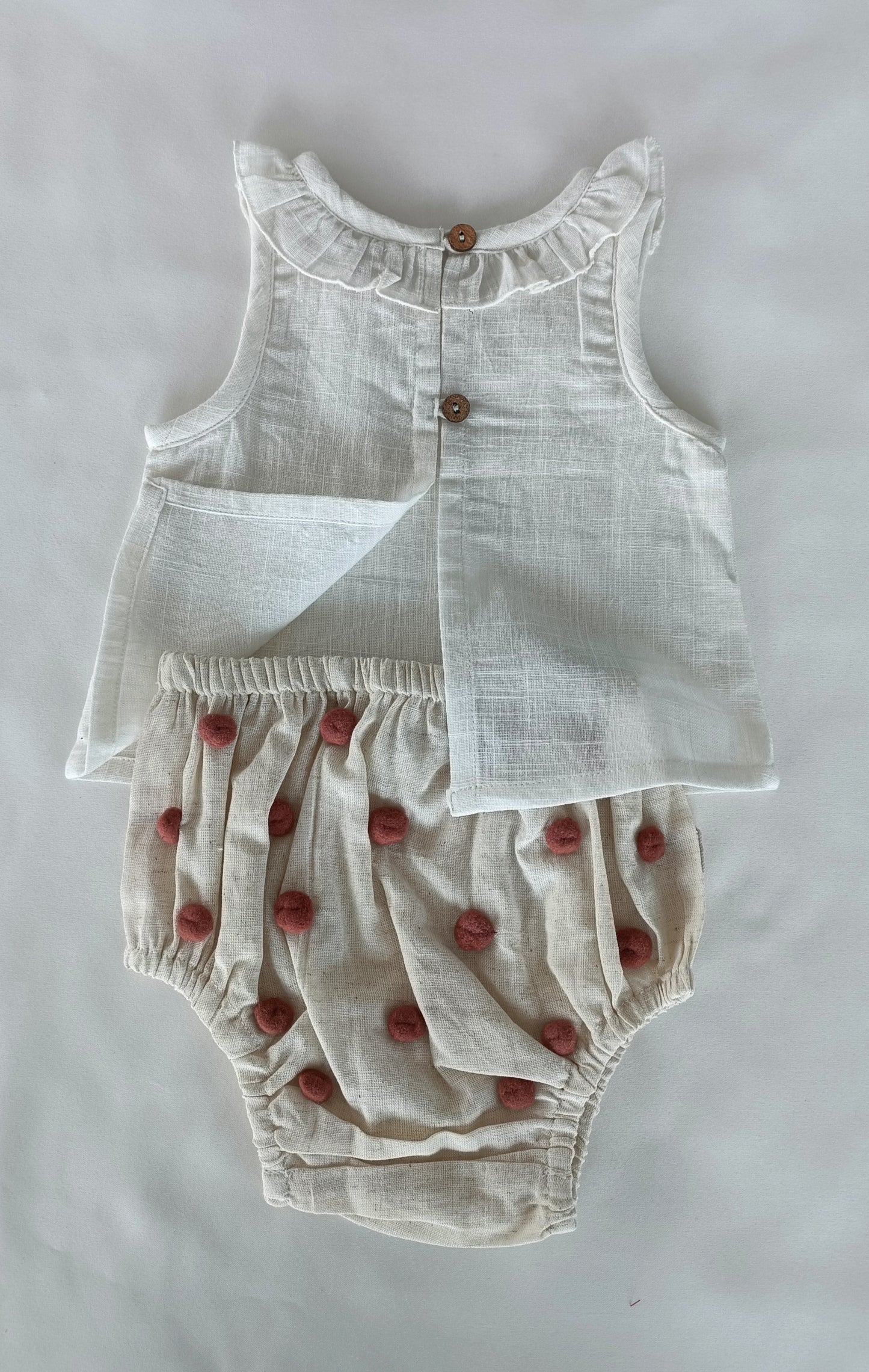 White Ruffle Neck Top & Ivory Diaper Cover With Pom-Poms