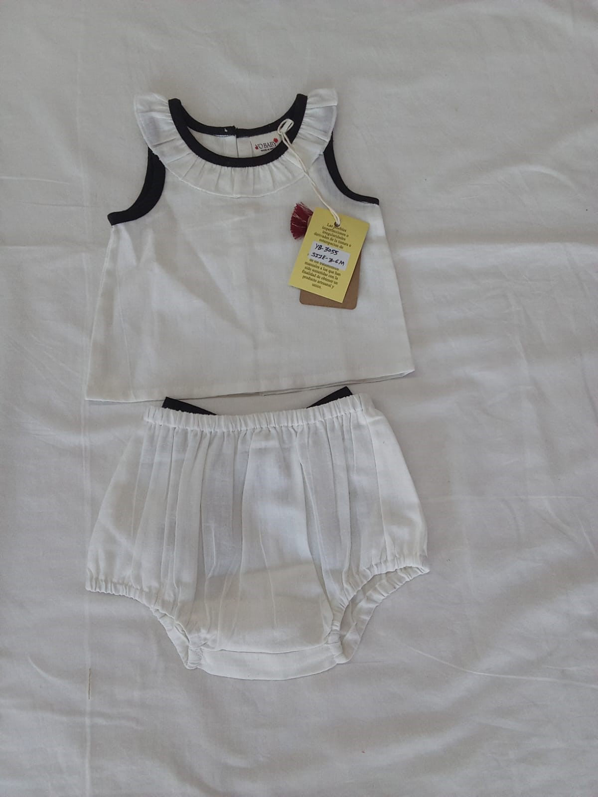 Black-Ruffled-Neck Top & Bow Diaper Cover