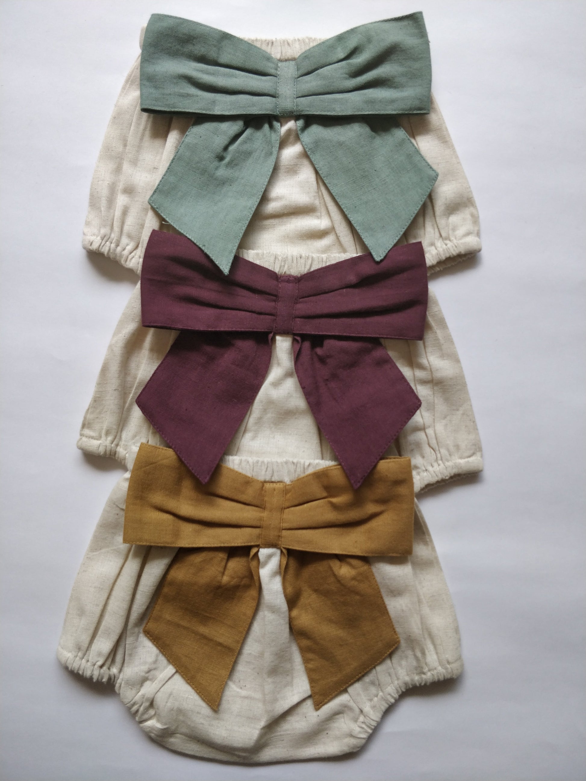 Set of 3 - Ivory Diaper Covers with Contrast Bows in Sage, Ochre & Burgundy.