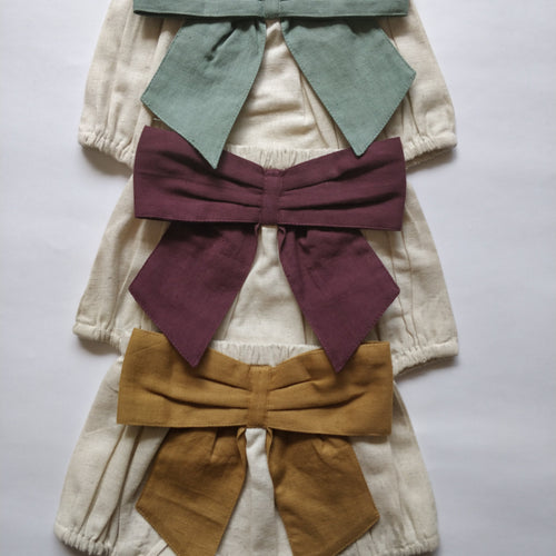 Set of 3 - Ivory Diaper Covers with Contrast Bows in Sage, Ochre & Burgundy.